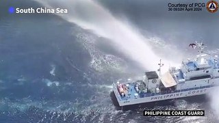 Philippines says China Coast Guard fired water cannon at its vessels