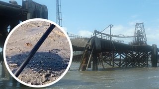 Footage shows oil leaking from a pipe into the River Mersey