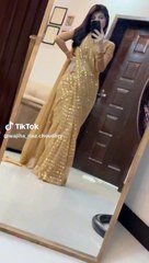 Beautiful girl in front of mirror