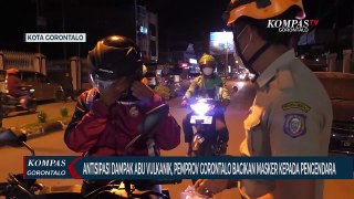 Antisipasi Dampak Abu Vulkanik, Pemerintah Provinsi Gorontalo Bagikan Masker Kepada Pengguna Jalan