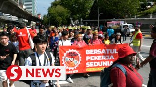 Workers march to demand for better rights on Labour Day