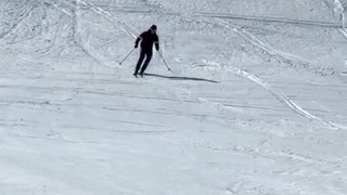 Skier Rolls Down Snowy Mountain While Attempting Stunt