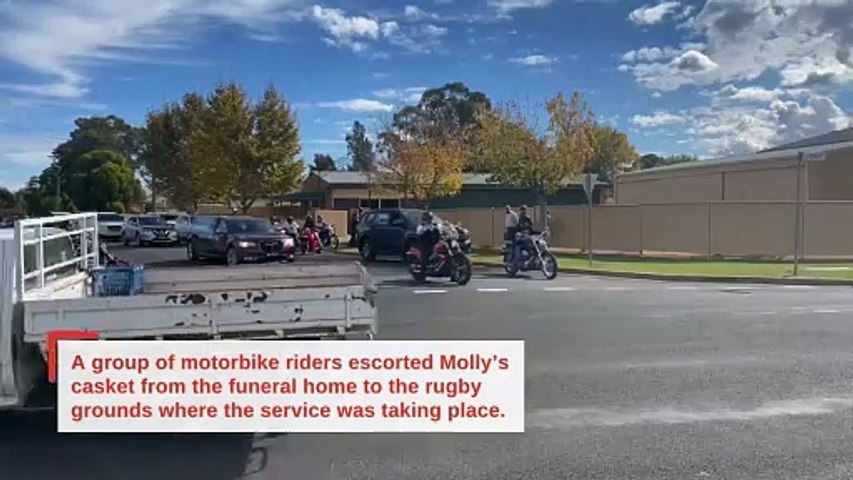 Her casket was escorted by a group of motorbike riders. Footage is by Carla Freedman