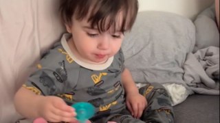 Caring big bro super proud of himself after newborn sister takes pacifier from him