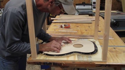 Luthier Building An Acoustic Guitar