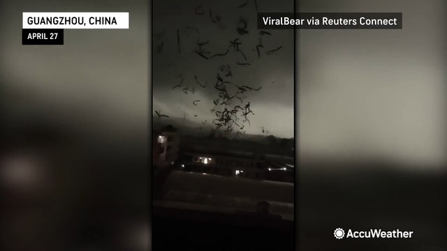 Debris swirls over Chinese city as tornado strikes