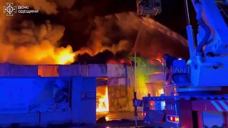 Ukrainian firefighters battle blaze after night missile attack on Odesa