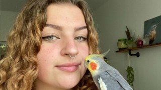 Gen-Z birdwatcher best friends with her cockatiel - who loves to dance and sing