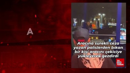 Sürekli ceza yiyen kişi aracını çekiciye yükleyerek gezdirdi