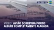 Vídeo de avião sobrevoando Porto Alegre alagada impressiona
