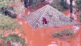 Residents rescued from rooftops following mass floods in Brazil
