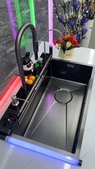 Upgrade your kitchen with the elegance of a waterfall-style sink, making a bold statement in your home.
