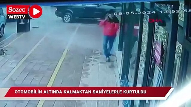 Otomobilin altında kalmaktan saniyelerle kurtuldu