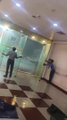 Mall Security Guards Struggle to Hold Doors Open in Torrential Rain