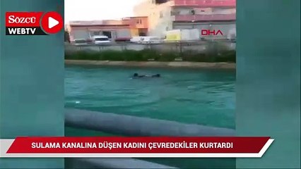 Download Video: Sulama kanalına düşen onun çevredekiler kurtardı