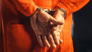Here's The Real Reason Prisoners Wear Orange