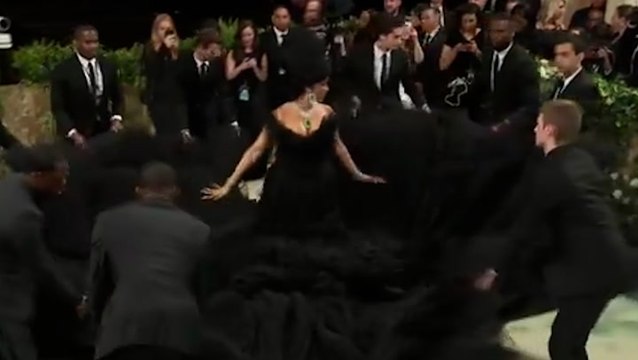 Cardi B brings Met Gala red carpet to standstill as entourage fan out incredible dress