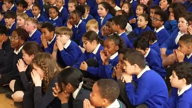 The Queen opens a new Coronation Library at a primary school