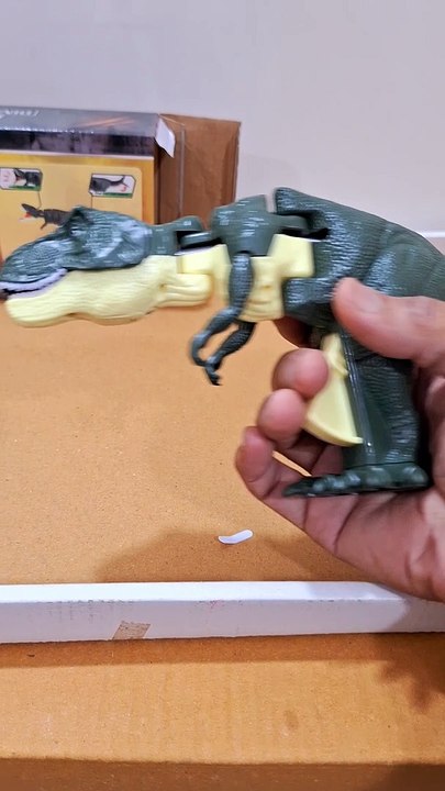 Gun Finger Innovative Telescoping & Swinging Features Plastic Design Engaging Sound Effects Lighting Tyrannosaurus Rex Head Swing Bite Trick Animal Gift for Boys and Girls Infant Toddler