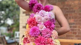 Mum designs a stunning dress made of 210 fresh flowers