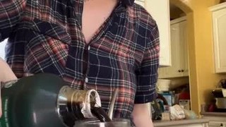 Woman Drops Glass Jar While Pouring Coffee in It