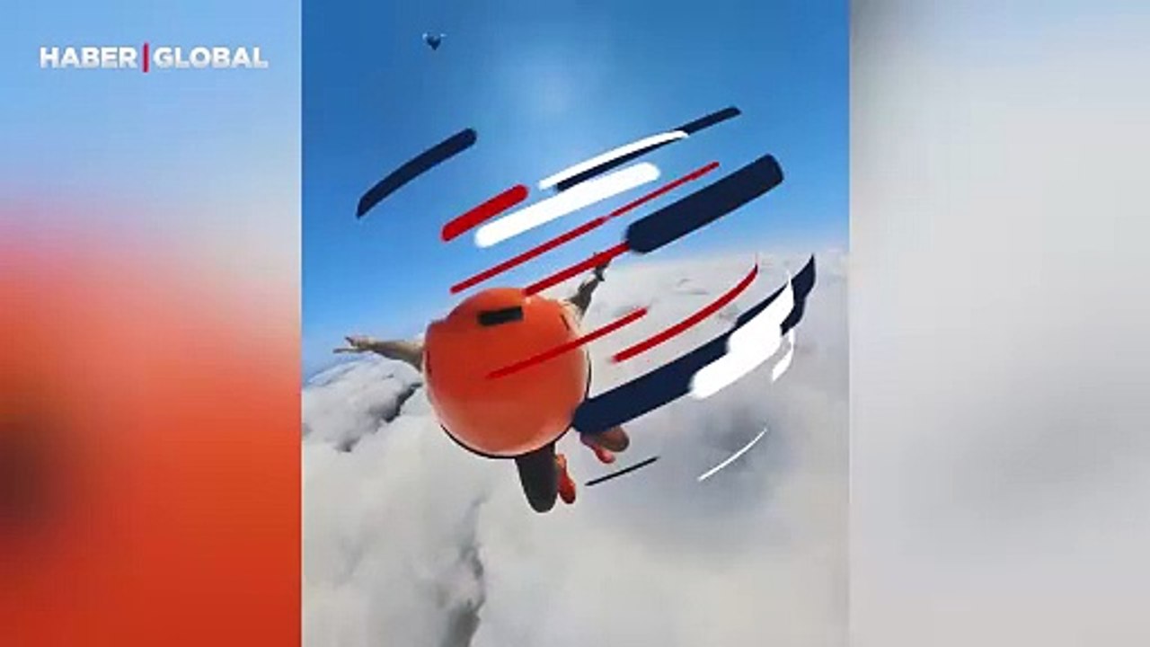 Paraşütlünün yağmur bulutu içerisinden geçtiği anlar sosyal medyayı salladı