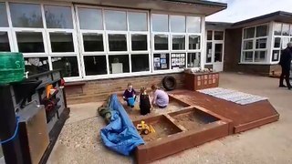 Children 'amazed' as AESC volunteers bring their outdoor learning area back to life