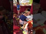 Man Slips and Falls While Climbing Down Stairs in Parade Float