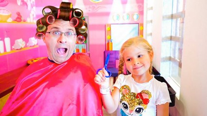 Diana and Roma interact with fun exhibits at the museum