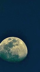 The moon from last week before dark over the Haulover Inlet in Bal Harbour, Florida