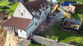 Farmhouse hanging over cliff edge gets demolished