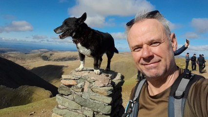 Dog believed to be first ever pooch - to climb every mountain in England