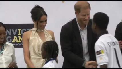Il principe Harry e sua moglie Meghan ad una partita di Polo