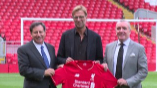 Jurgen Klopp Liverpool unveiling shirt shots - 2015 archive