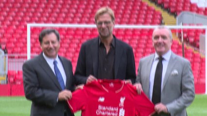 Jurgen Klopp Liverpool unveiling shirt shots - 2015 archive