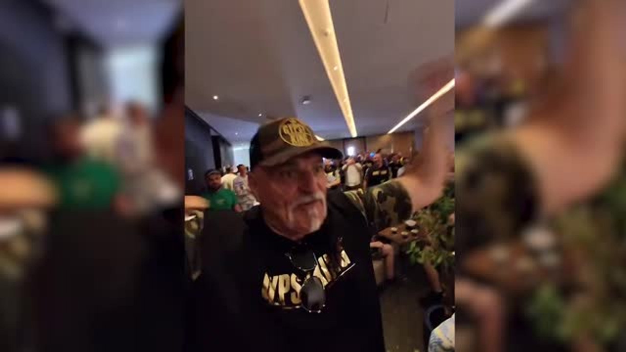 John Fury head butts a member of the Oleksandr Usyk's camp