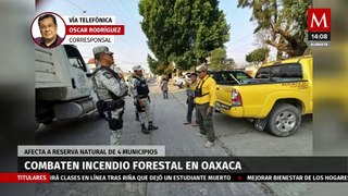 Tras protestas de habitantes, combaten con helicópteros incendio forestal en Oaxaca