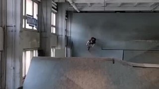 BMX Rider Performs Some Tricks on Ramp