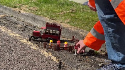 I visit potholes and photograph toys inside the biggest ones