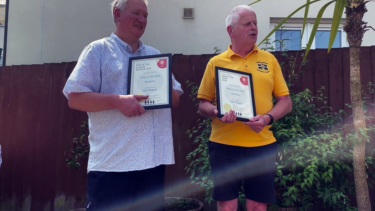 Steve Hall, landlord at the Hole in the Wall, presented with the CAMRA Pub of the Year Award