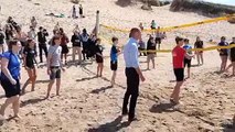 Prince William plays volleyball at Fistral Beach