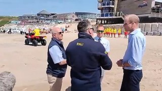 Prince William talks to RNLI lifeguards at Fistral Beach