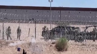 Watch: Guards at US-Mexico border pepper-spray migrants