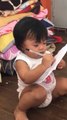 Adorable Toddler Imitates Fourth Grade Aunt Writing on Paper