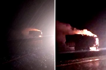 भारी बारिश के बीच सड़क पर दौड़ रहा था आग की लपटों में घिरा ट्रक