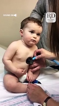 Adorable Baby Boy Cuddles on Nurse
