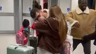 Sweet moment new dad meets two-month-old son for the first time at airport