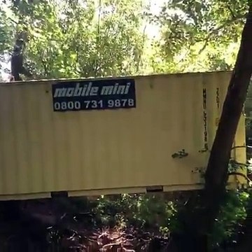 A container that floated away in the Skenfrith floods is recovered miles downstream