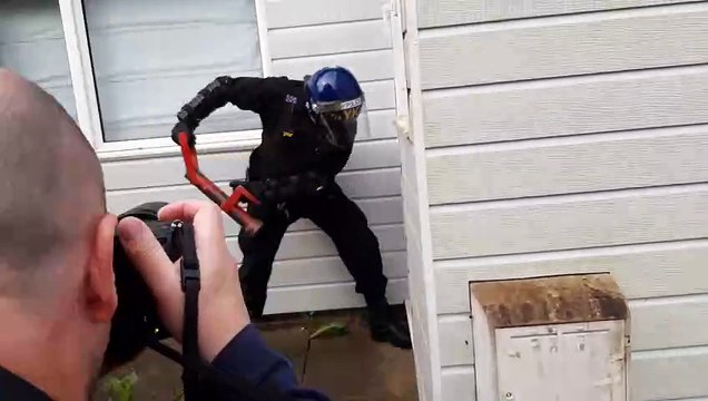 Police bash down door of cannabis factory in Telford
