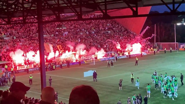 Celtic stand erupt with flares